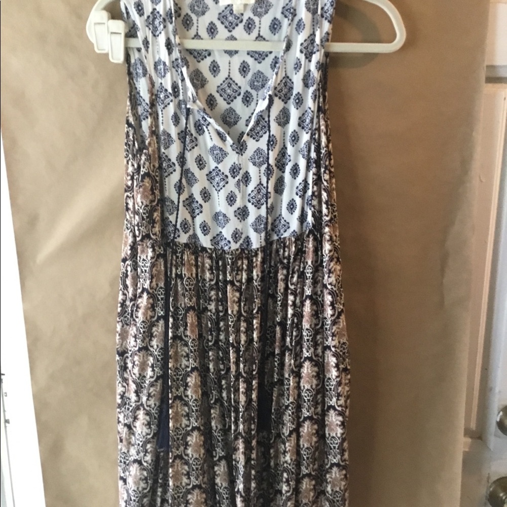UMGEE sleeveless tunic. Tassel ties.